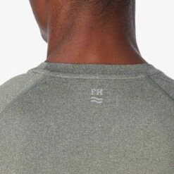 The BreezeKnit™ Tee | Thyme -Fair Harbor SP23 ON FIG BREEZEKNIT HEATHER DARK GREEN 053 9af064ff 085d 46a2 83a9 550a139f995b